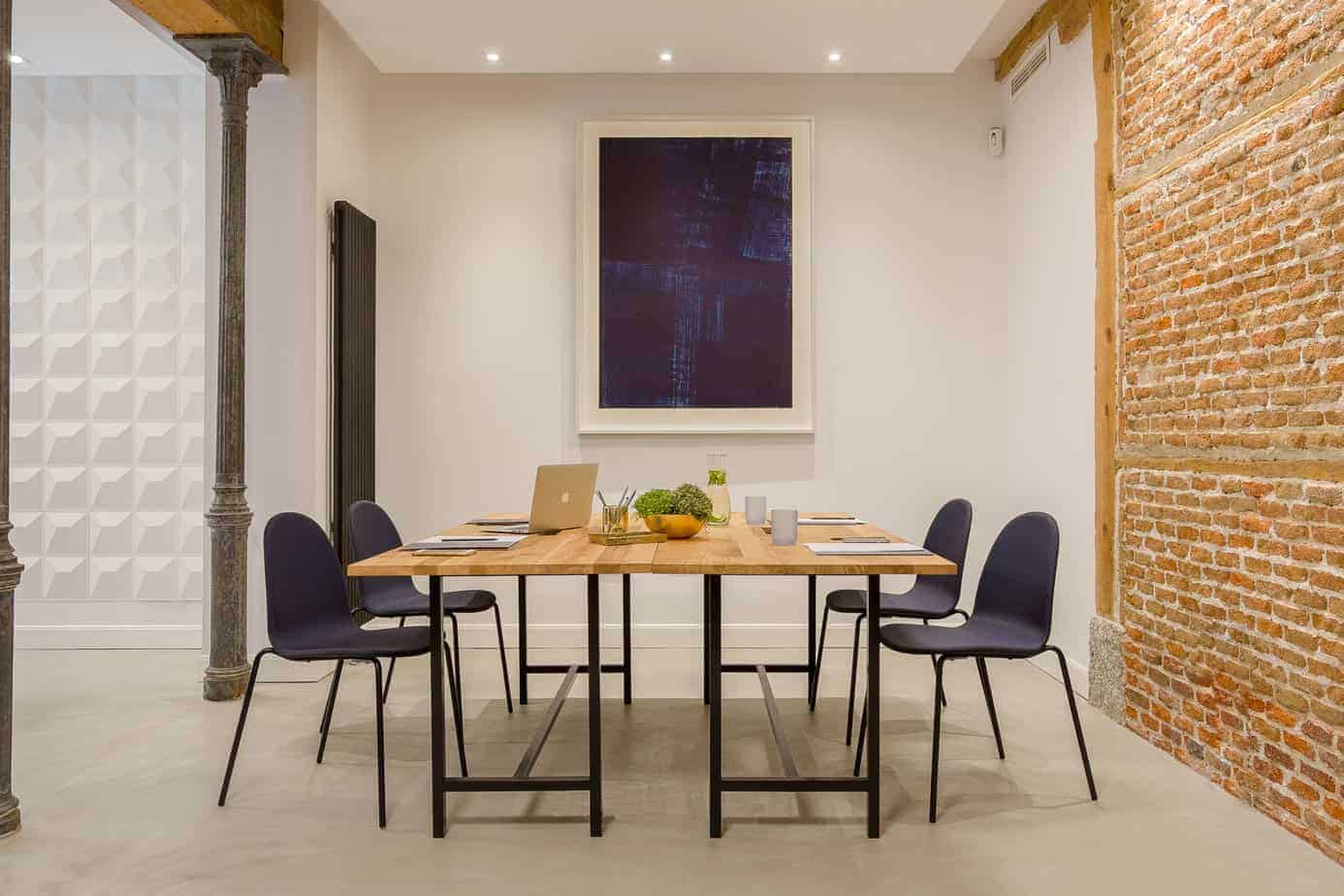 Stylish meeting space with brick walls