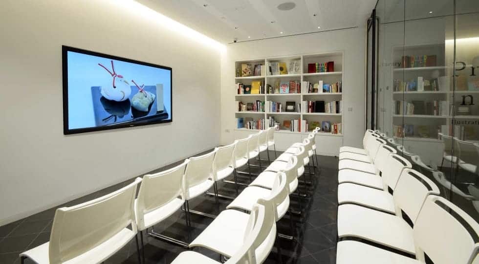 Sleek meeting location with a book's display