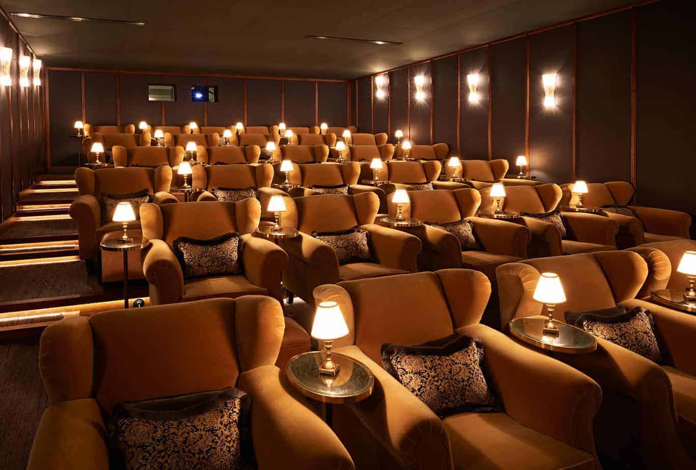 Original screening room with velvet armchairs
