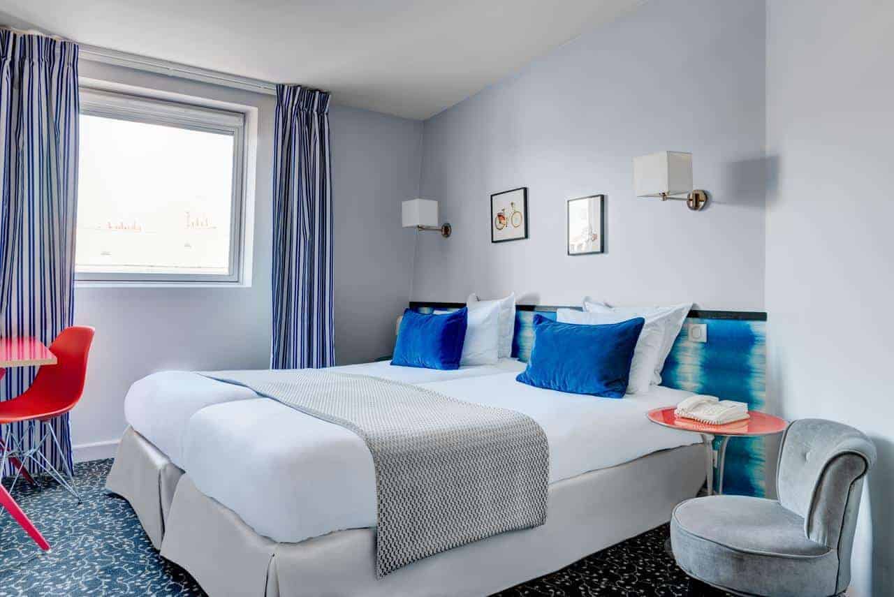 Charming hotel in the heart of Paris. Bright and modern rooms with contemporary furniture.