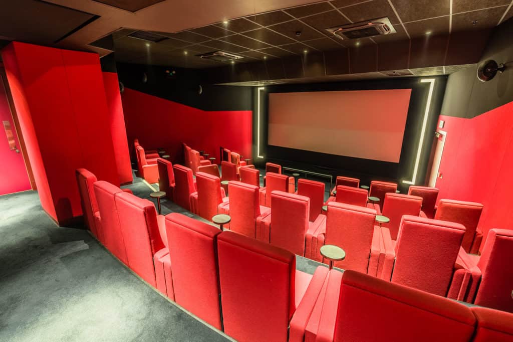 Unique conference room with a cinema-style with a quirky design and 40 Pullman seats.