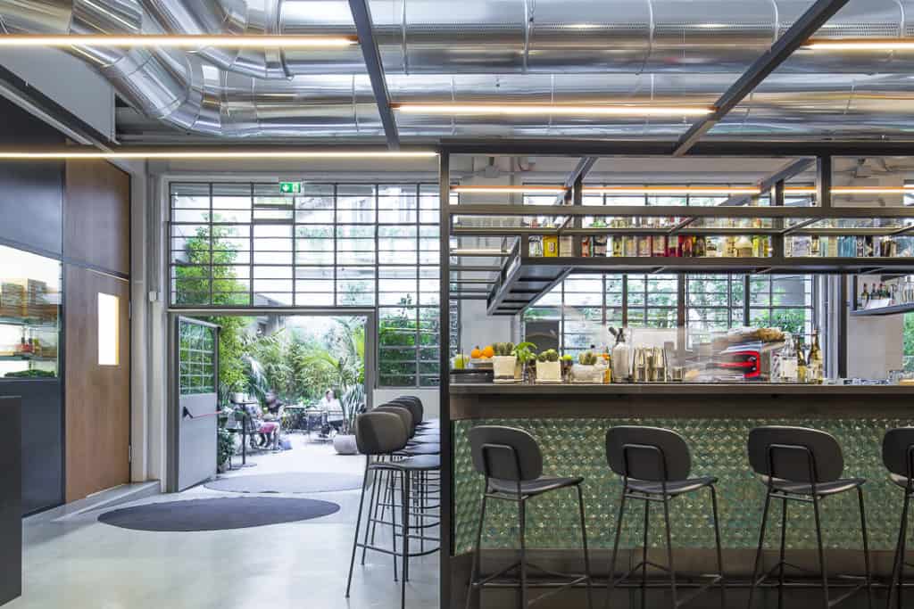Contemporary dining space with a welcoming atmosphere featuring an industrial and modern design.