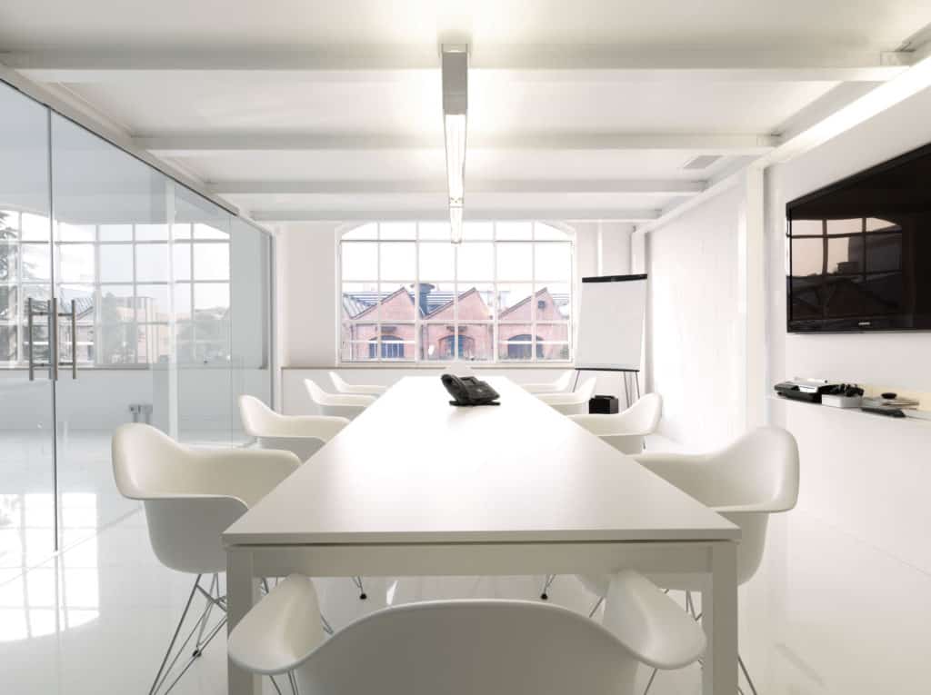 Multipurpose white loft with an uncluttered design featuring a minimalistic aesthetic.