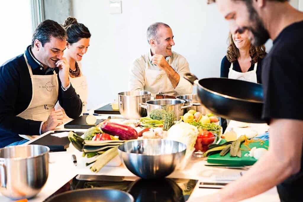 Group of people enjoying a Spanish cooking class