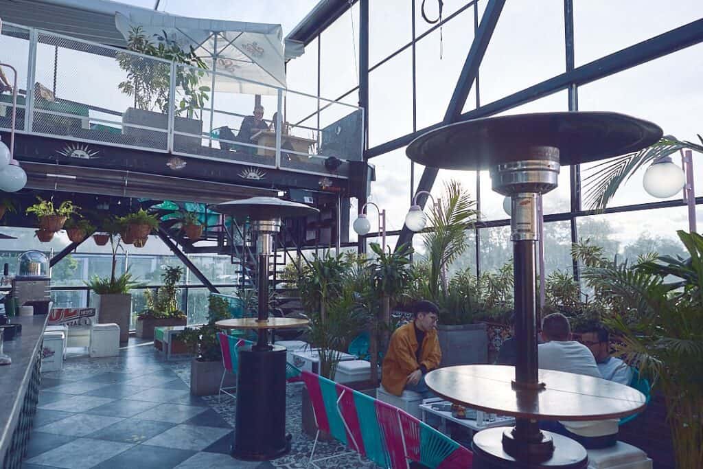 Dazzling rooftop with glass walls for afterworks